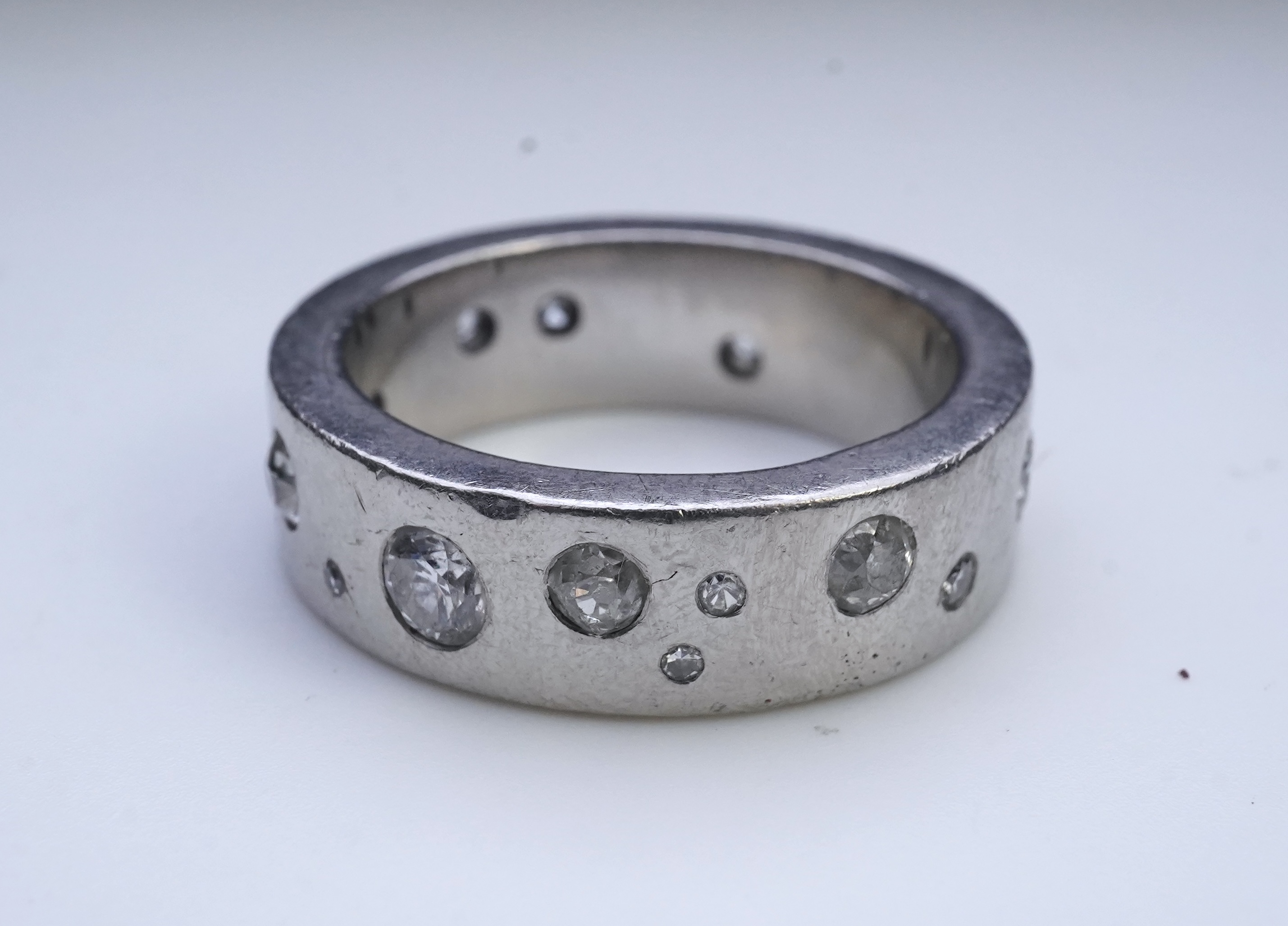 A platinum and diamond eternity ring